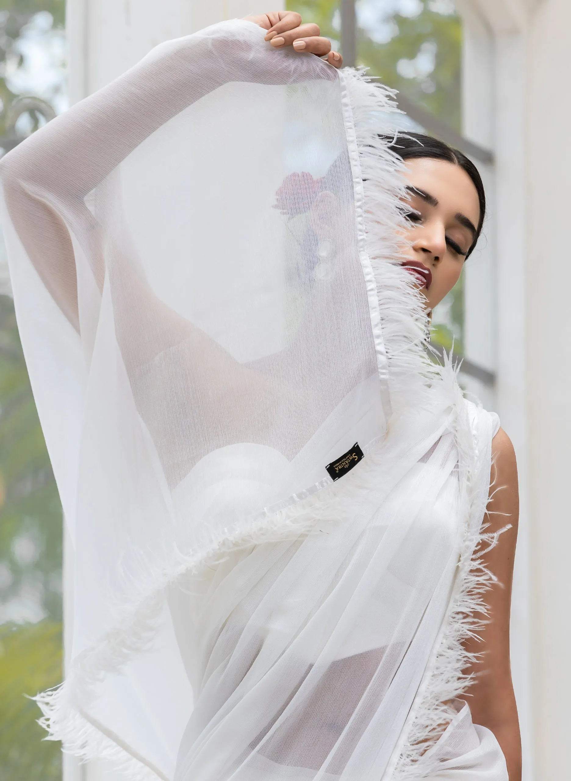 Gala Ready White Shimmer Saree with Faux Feathers and Blouse Fabric